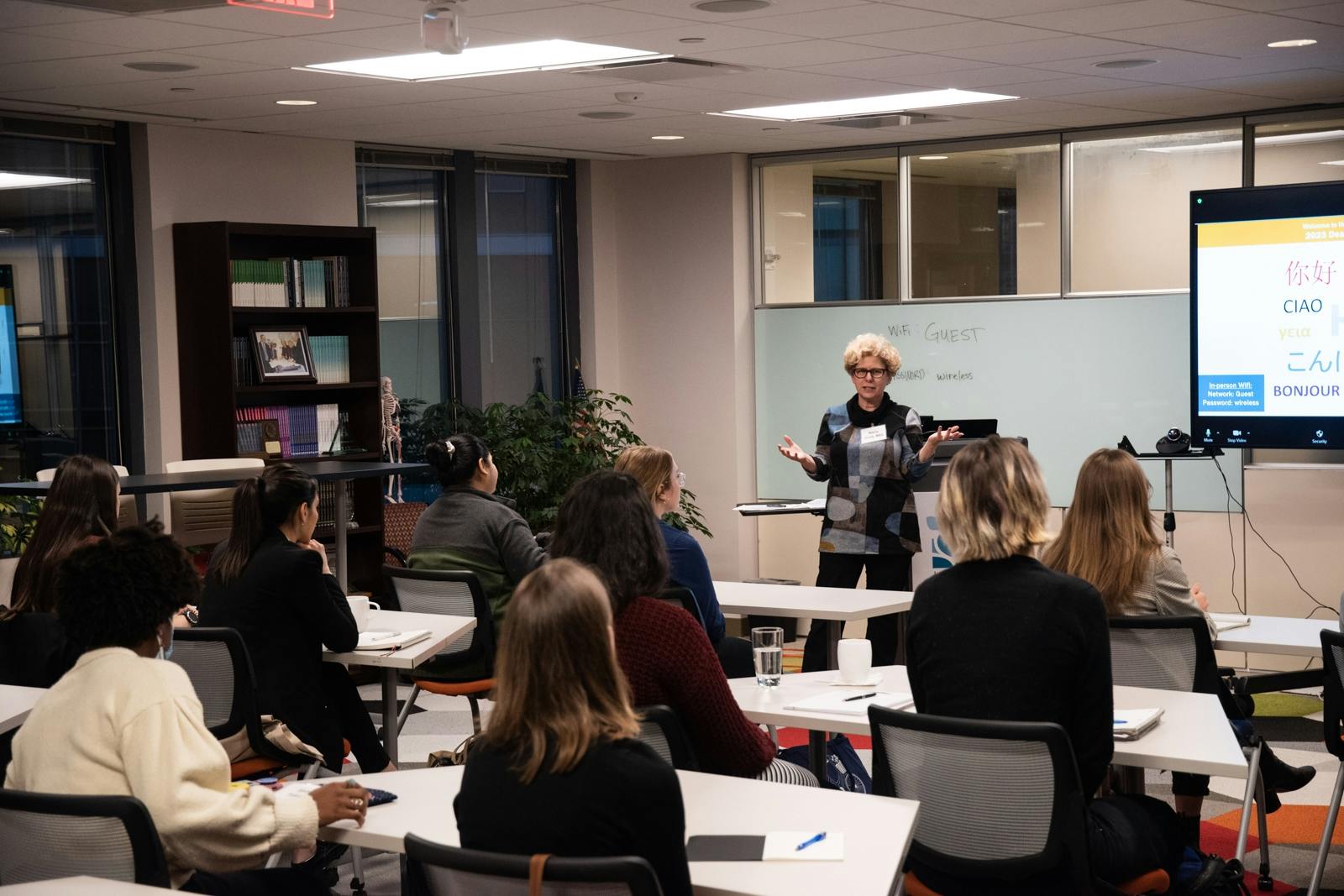 JHF COO and Chief Program Officer speaks to fellowship participants at the JHF offices.